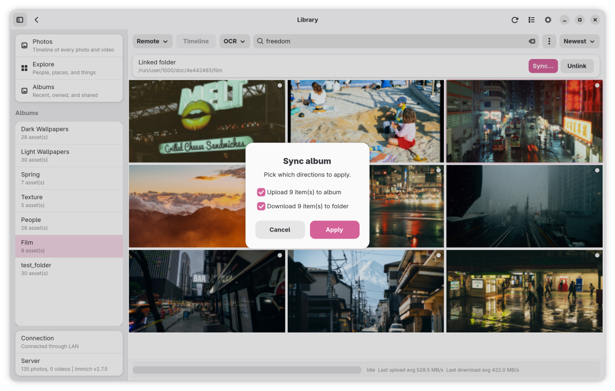 Album sync dialog with upload and download actions